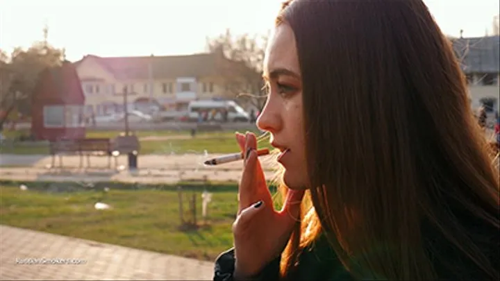 Ksenia is answering the questions while smoking two strong cigarettes one by one (Saratoga and Marlboro Red)