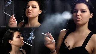 18 y-o Nastya is smoking two 120mm all white cigarettes