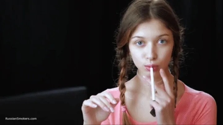 Watch the beauty with crystal blue eyes smoking a 120mm cigarette in her fresh video