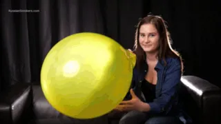 18 y.o. babe Marina blowing up a huge yellow balloon