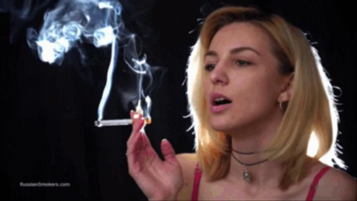 Look at the lovely Sasha smoking a Marlboro red 100s cigarette in this closeup video