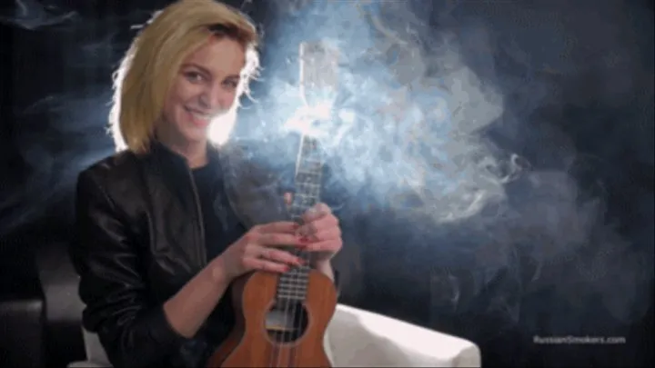 Sexy blonde Sasha is playing the Ukulele while smoking a cigarette