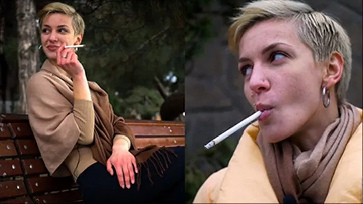 Short cut hair blonde girl is smoking all white 120mm cigarettes