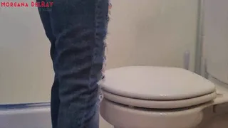 Side View Toilet Use In Ripped Jeans