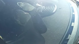 Nylon soles against the windshield
