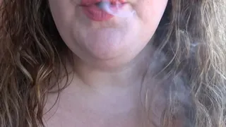 Smoking with long curly hair