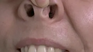 Push your nose up with your finger and flare your lovely big nostrils on extreme close up