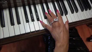 long pink fingernails playing piano - full clip