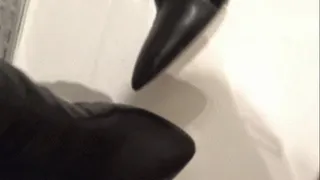 Peeing on her shoes