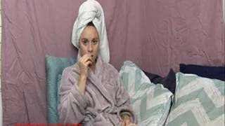 Audrey sneezes and soils bathrobe