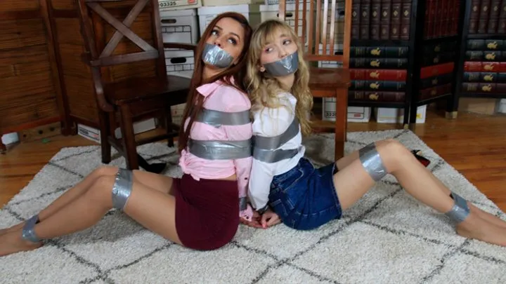 Wearing Skirts and Pantyhose, Vanna Bardot and Mackenzie Moss are Thoroughly Taped Up!