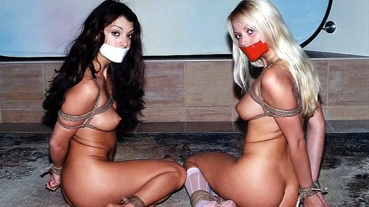 Enticing European nudes Isabella Janacek and Jana Cova played together while trussed and tape-gagged on the floor!