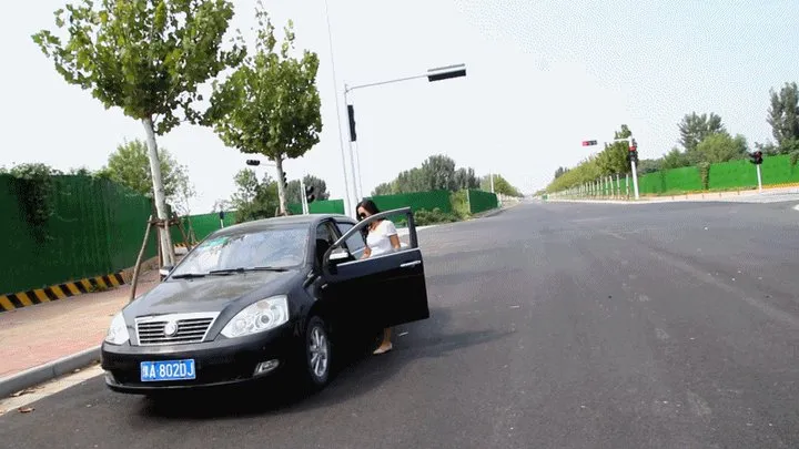 Martina practicing driving outdoors