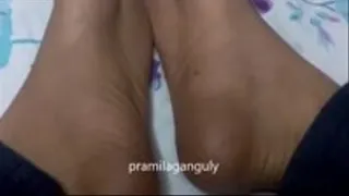 Barefeet Soles on Bed