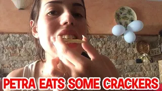 Petra eats some crackers