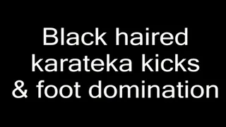 Black haired karateka kicks & foot domination