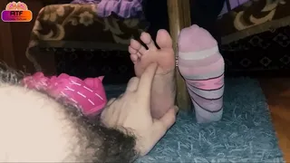 Tickling feet under table