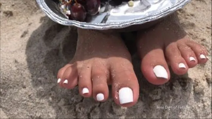 Marshmallow toenails in the sand