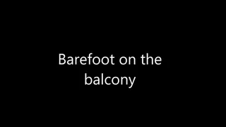 Barefoot on the balcony