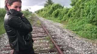 Leather glovejob on the railroad tracks POV