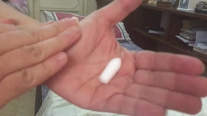 White,hard suppository to play with!