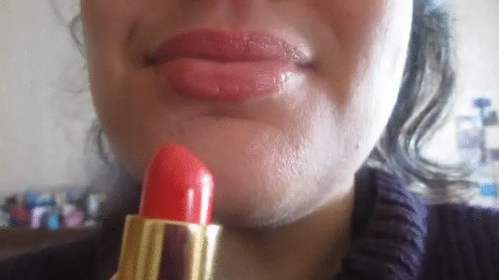 Applying sexy red lipstick