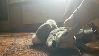 SLAMMING HER PLUSH FRIEND WITH HER FLAT SLIPPERS