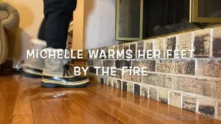 Michelle Warms Her Feet by the Fire