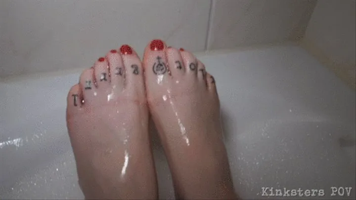 Splish Splash: Emma plays footsie with herself in the bathtub [