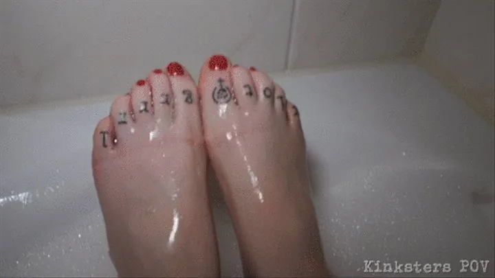 Splish Splash: Emma plays footsie with herself in the bathtub [ ]