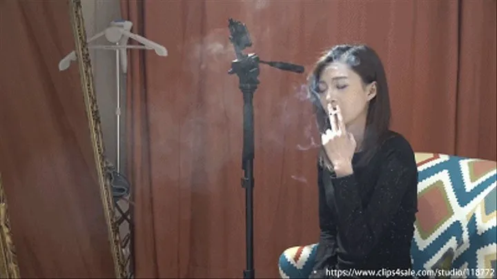 Beautiful girl Yiran chain smoke two cigarettes