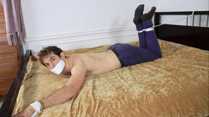 Young High Powered Businessman is Tied Down on a Bed!