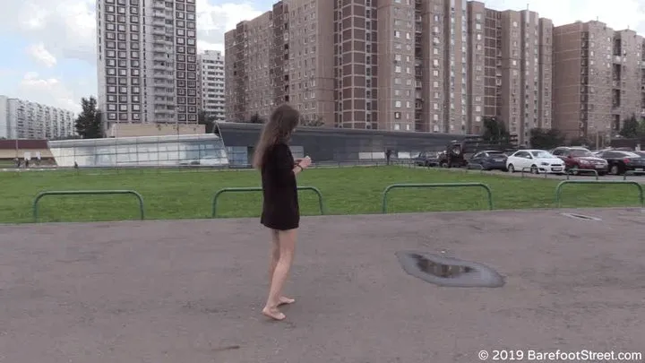 Beautiful petite girl Helena walks barefoot on asphalt and puddles (Full with 36% discount)