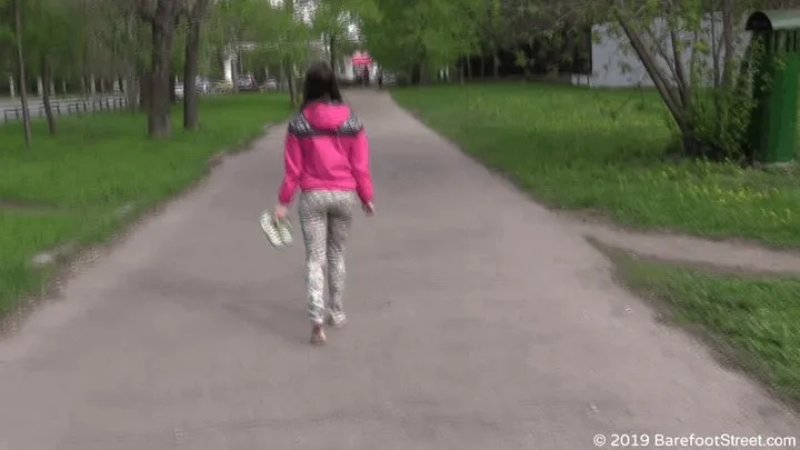 Girl next door Anastasia walks barefoot in the spring city (Part 6 of 6)