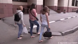 Three young students walk barefoot in the city (Full)