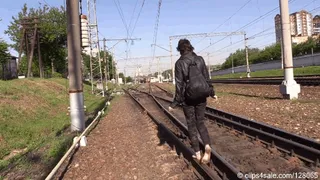 Extremely dirty soles of hippie girl Oksana on the railway