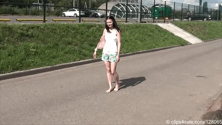 19-year-old beauty barefoot in the city (Part 1 of 2)