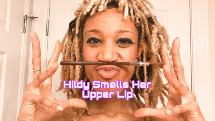 Hildy Smells Her Upper Lip