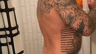 Taking a shower and shaving!