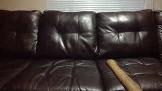 Action hero jerks off on the couch after a workout