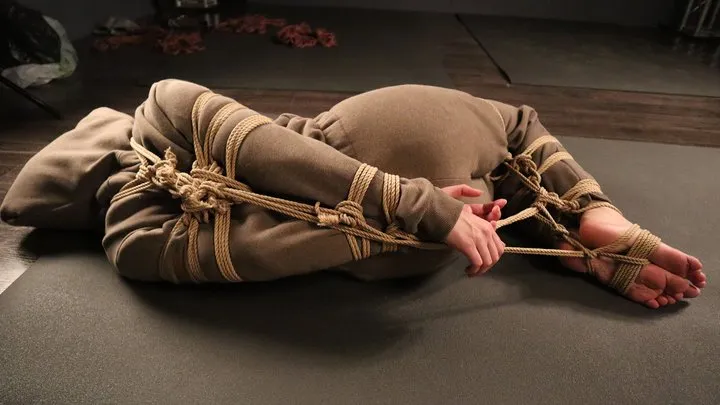 Sofi in overalls tied with jute ropes  Hogtie  Part 2