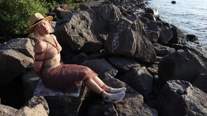 Sofi  Bondage in a hat by the sea