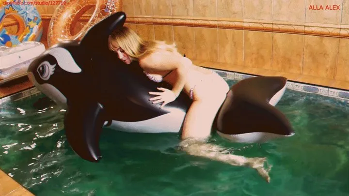 Hot fucking of a tightly inflated inflatable whale in the pool