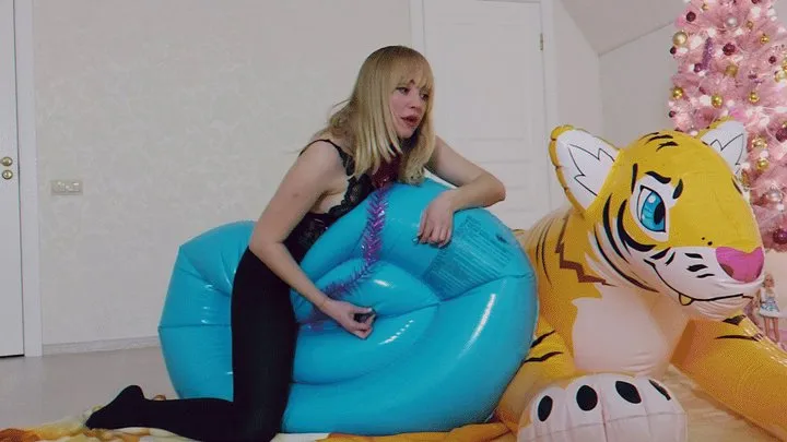 Alla blows away a rare inflatable raft and an inflatable tiger