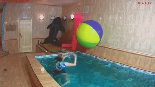 Alla plays in the pool with a large beach ball and blows it away!!!