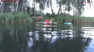 Alla swims in the lake and wears a red inflatable vest!!!