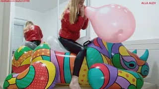 Alla inflates two balloons with her mouth and makes S2P of a transparent balloon riding an inflatable rhinoceros and makes B2P of a red balloon!!!