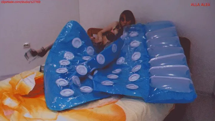 Alla inflates a large transparent air mattress with her mouth!!!