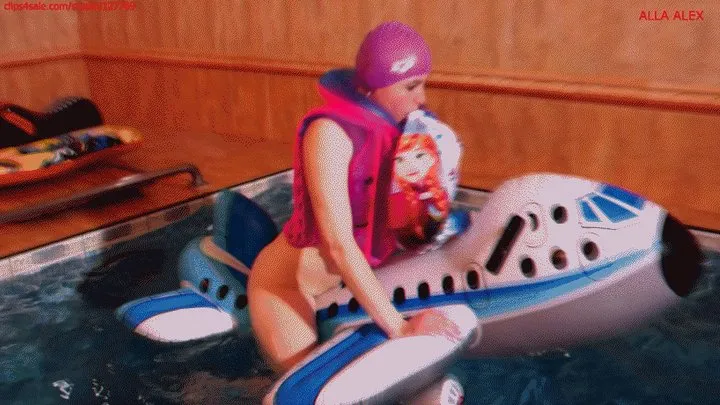 Alla is fucking hot with a big inflatable plane in the pool and playing with a beach ball!!!