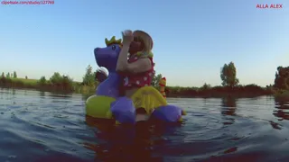 Alla is a hot rider on a squeaky inflatable magic dragon on the lake!!!